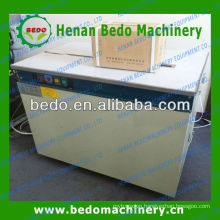 2013 the best selling manual table type pp belt tying machine for box/carton 008613253417552